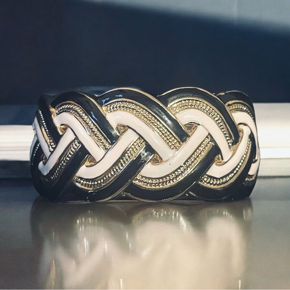 Black And White Braided Cuff Gold Plated this is a great statement piece.